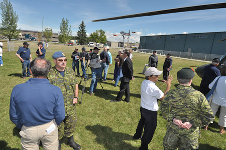 Rob Pedersen talks with the media
