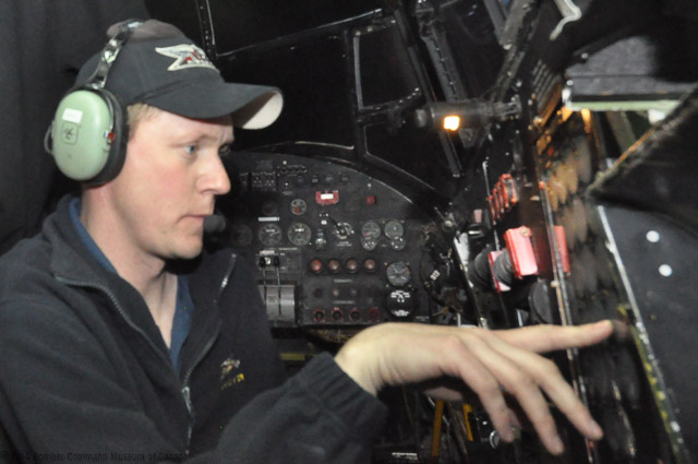 Greg watches the dials